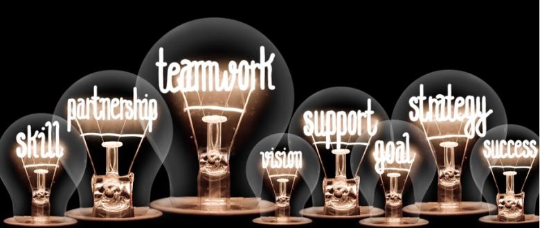Light bulbs showing teamwork, vision, support, training
