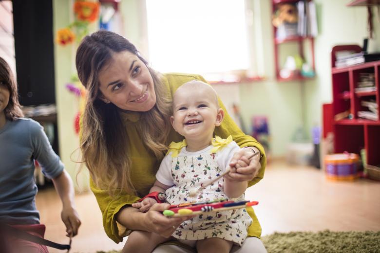 Teacher with baby