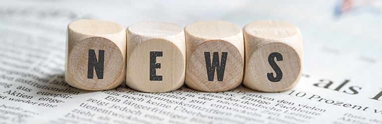 News spelled out on wooden blocks